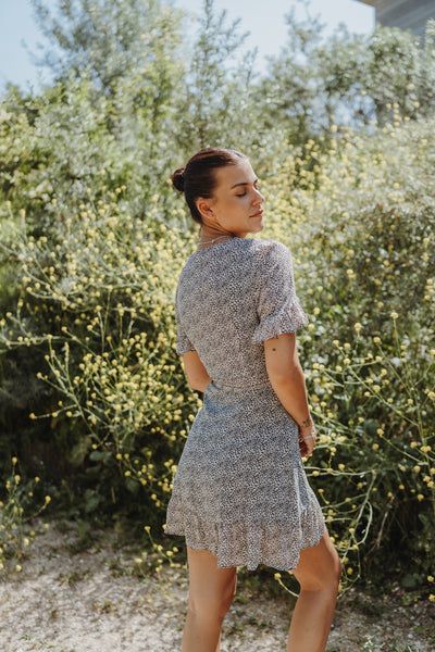 Kleid mit Gänseblümchen (Schwarz)